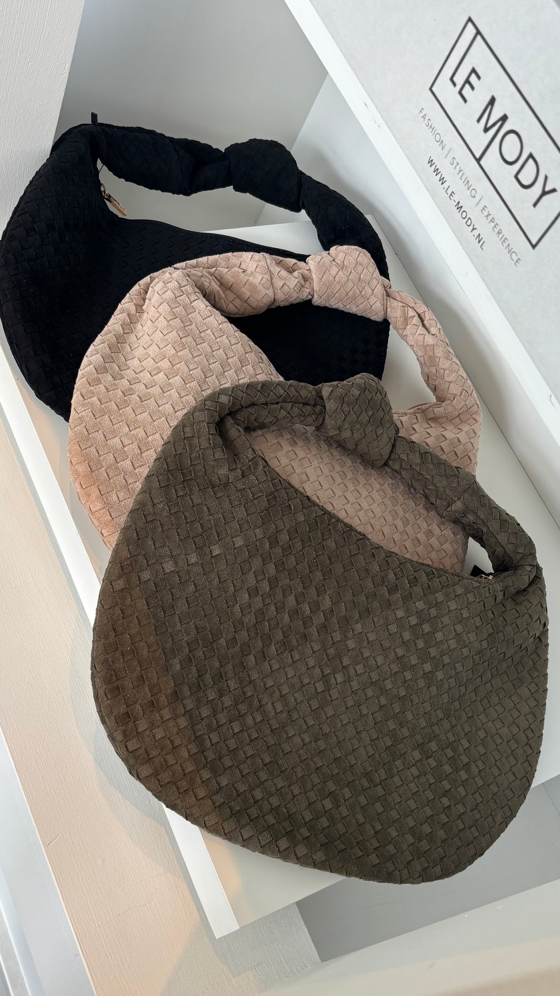 The Signature Row Bag